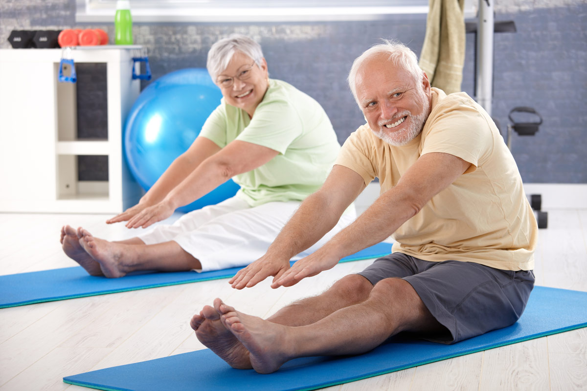 Ross Place retirement community seniors performing stretches and exercises