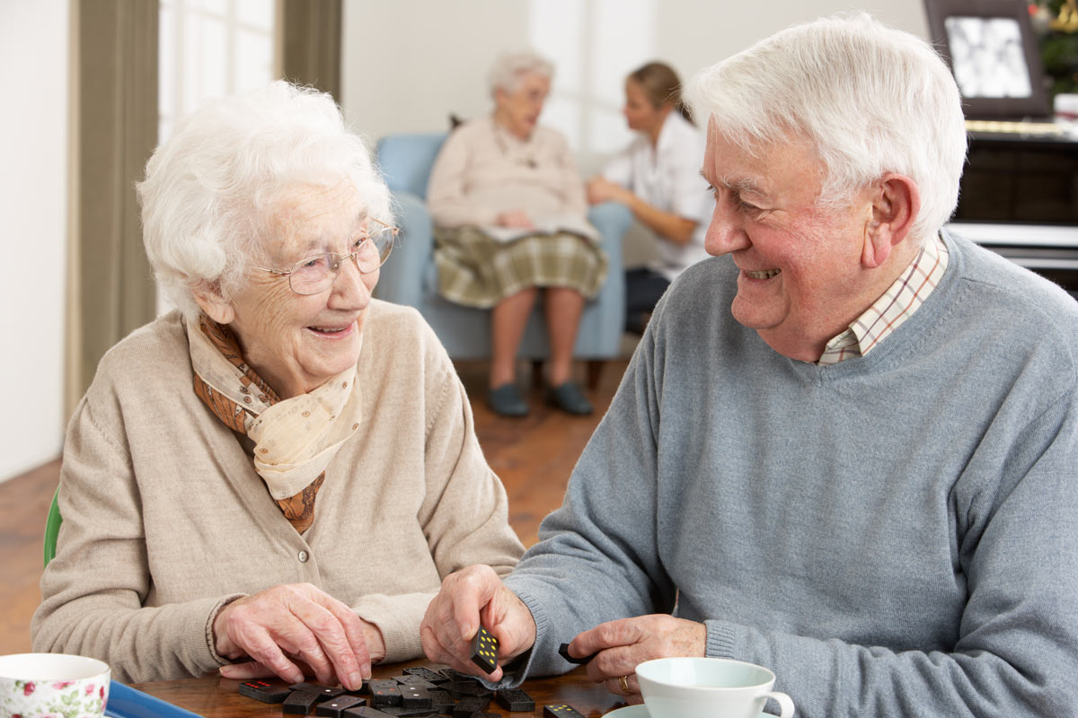 Ross Place Seniors Playing with Dominoes