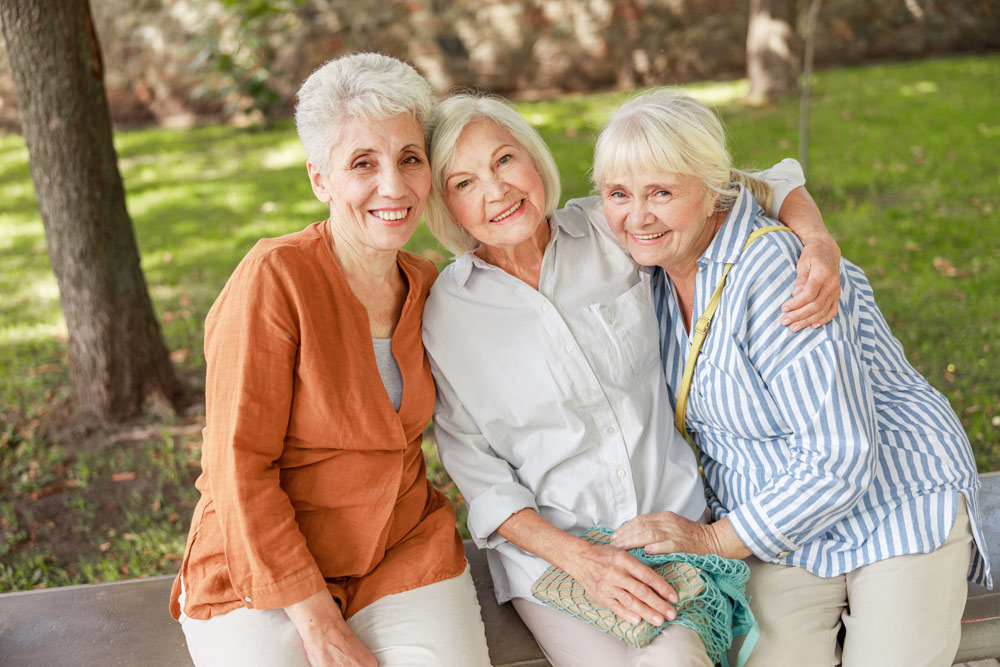 Senior Ladies Sitting Outside at Victoria VRS Retirement Community