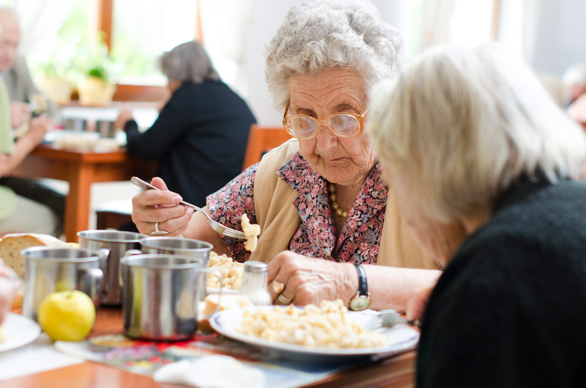 Senior Eating a Meal at Victoria Seniors Independent Living Community