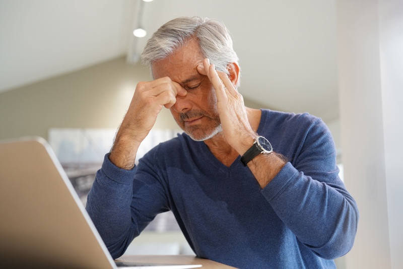 Senior with headache pain at an independent or assisted living community in Victoria