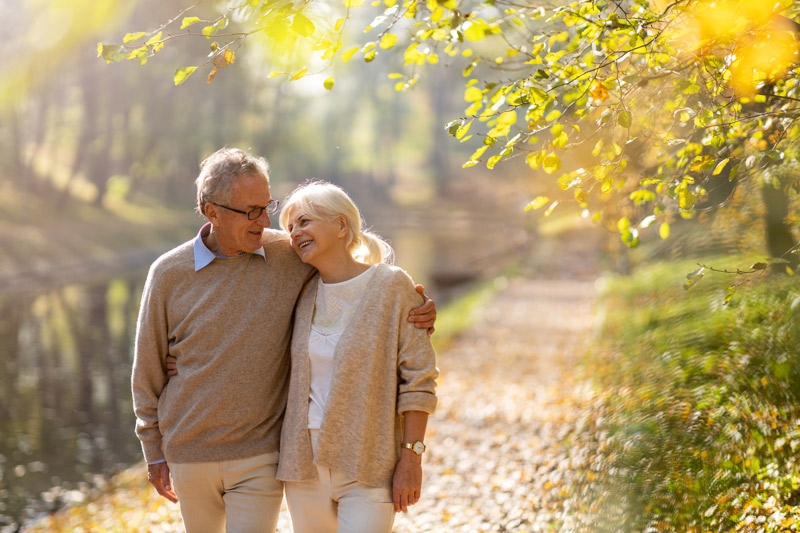 Senior Couple Walking Outside in the Fall at a Retirement Home in Victoria